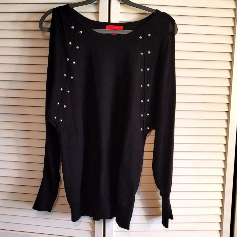 Jennifer Lopez cold shoulder sweater